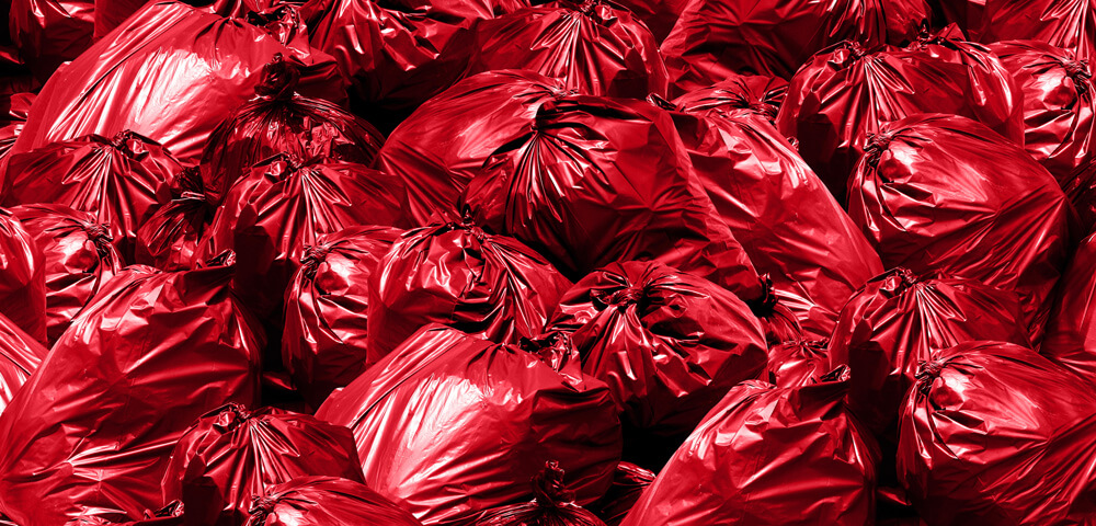 Pile of red bag waste