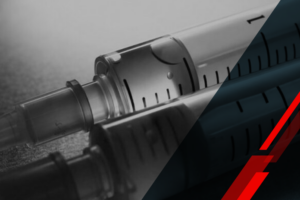 Close-up of a syringe with measurement markings, implying a medical injection